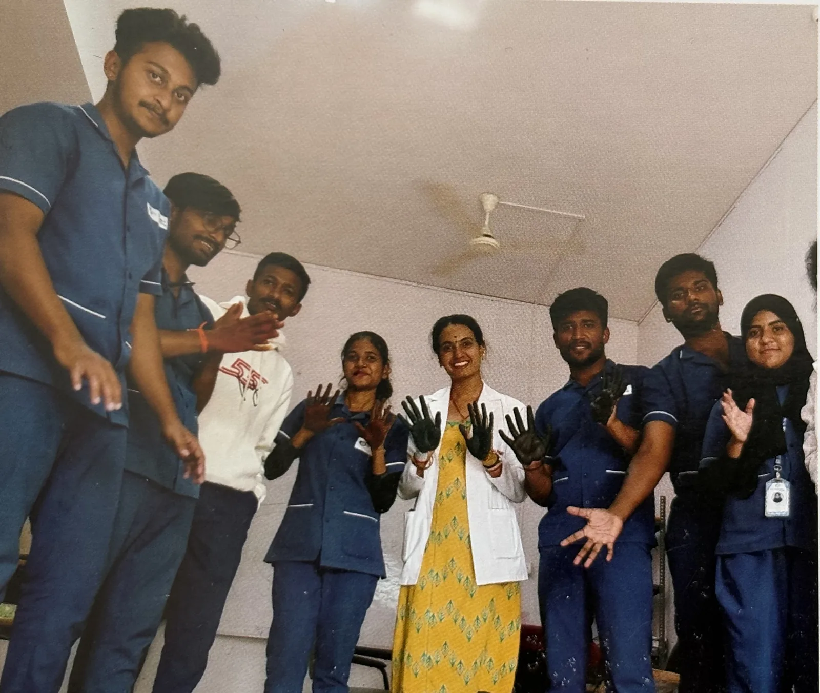 Allied health students with a faculty member during a practical session